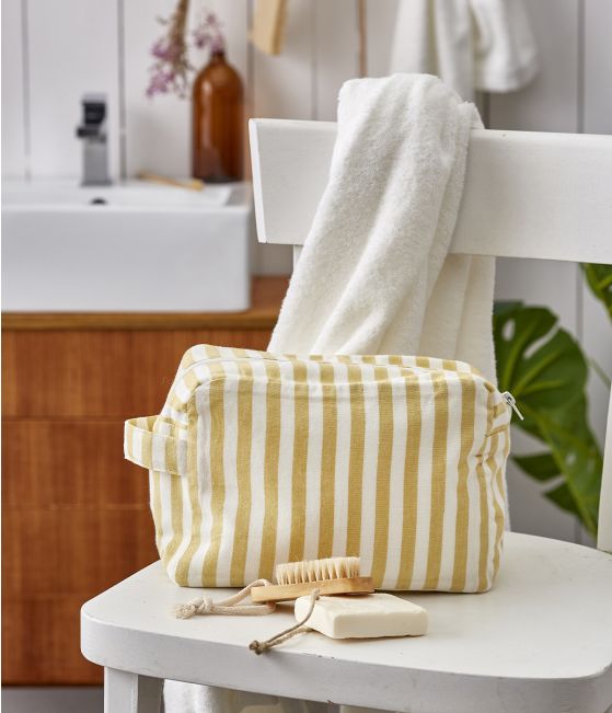 Yellow toilet bag. Le grand bain rayé jaune