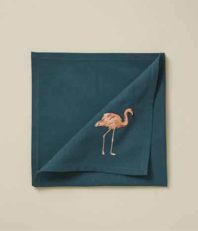 Serviette de table brodée Les voyageurs